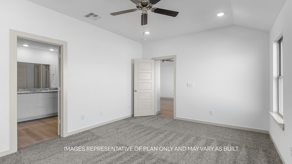 Primary bedroom with private attached bathroom and walk-in closet