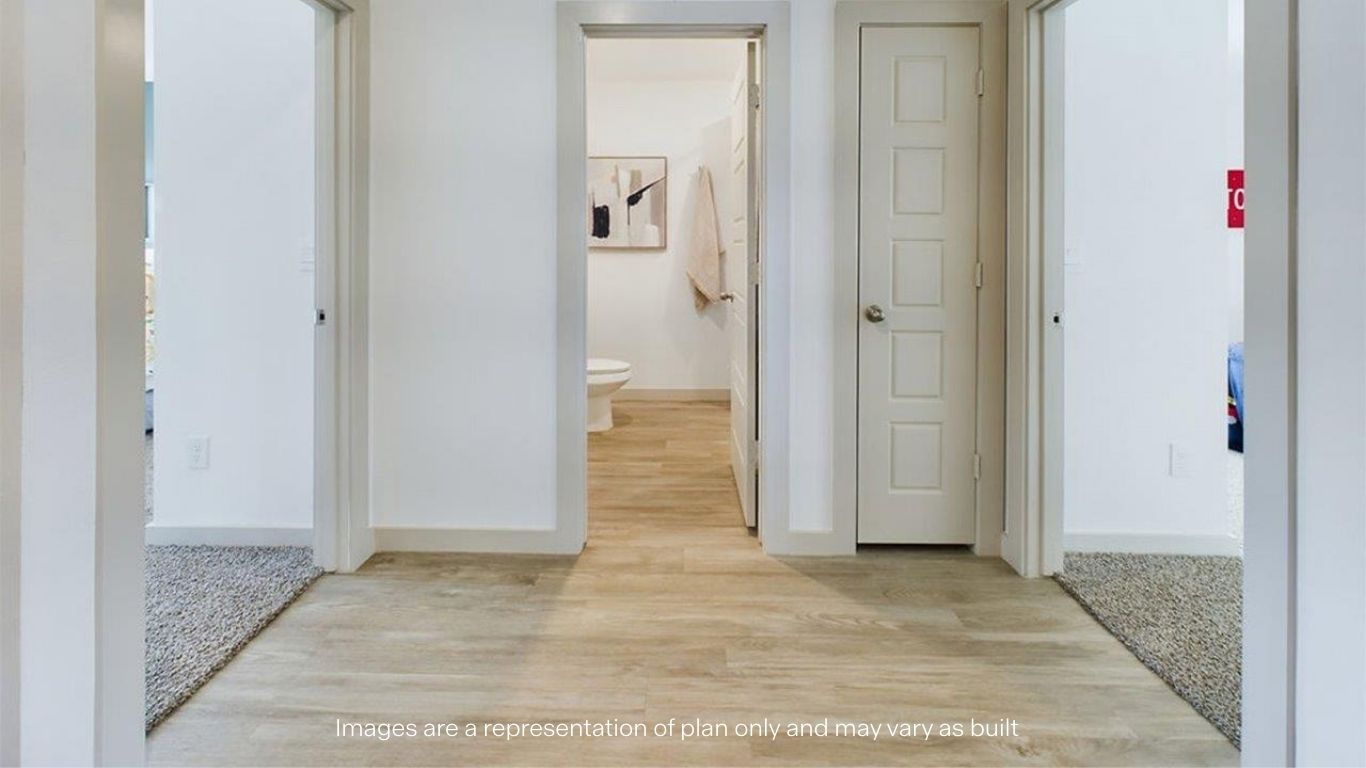Guest bathroom between guest bedrooms