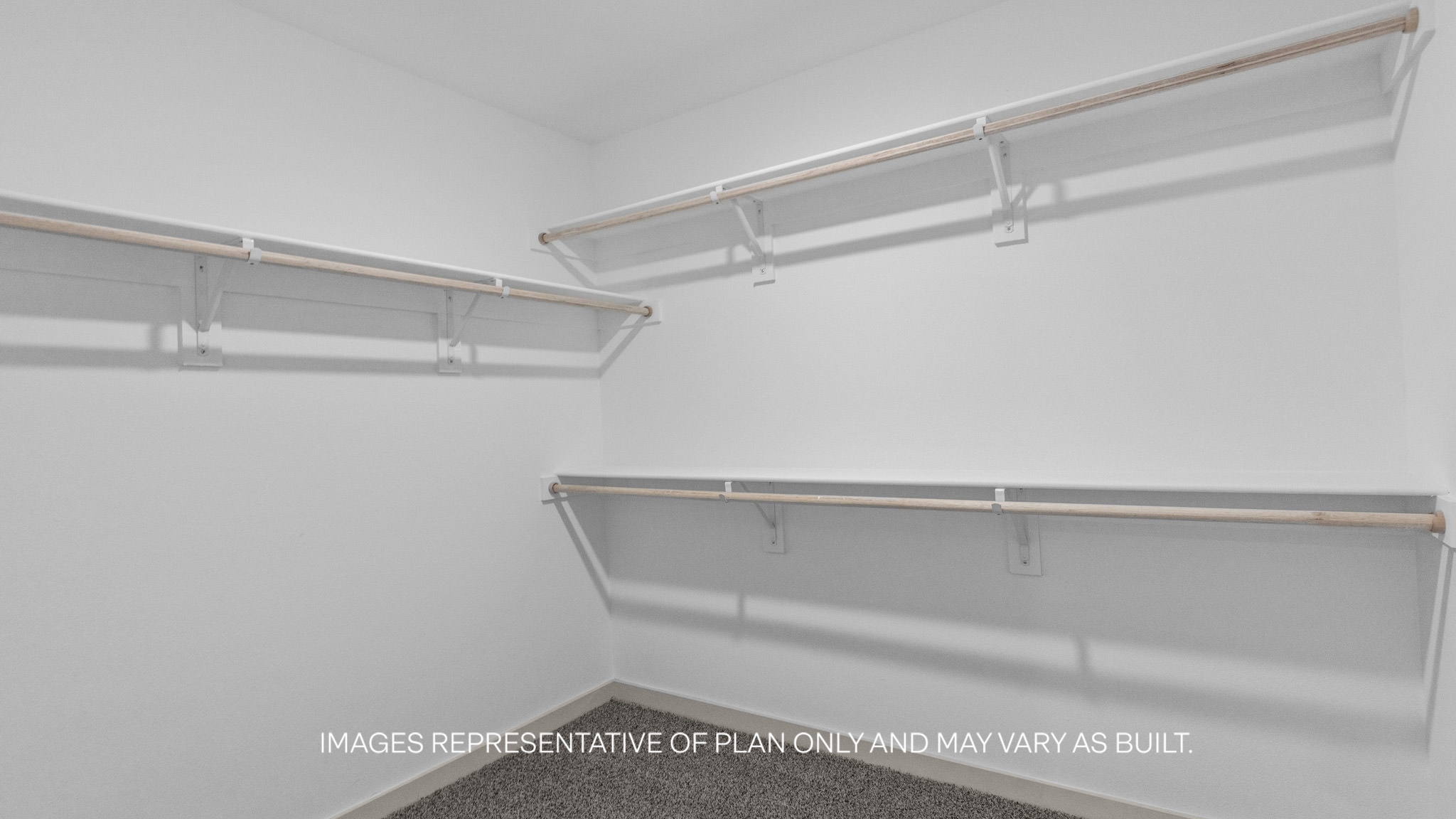 Primary walk-in closet with extra storage space