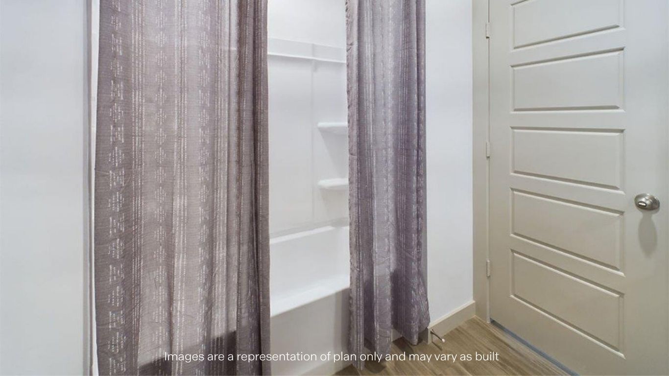 Guest bethroom with built in vanity, granite counter tops, and combination of tub shower