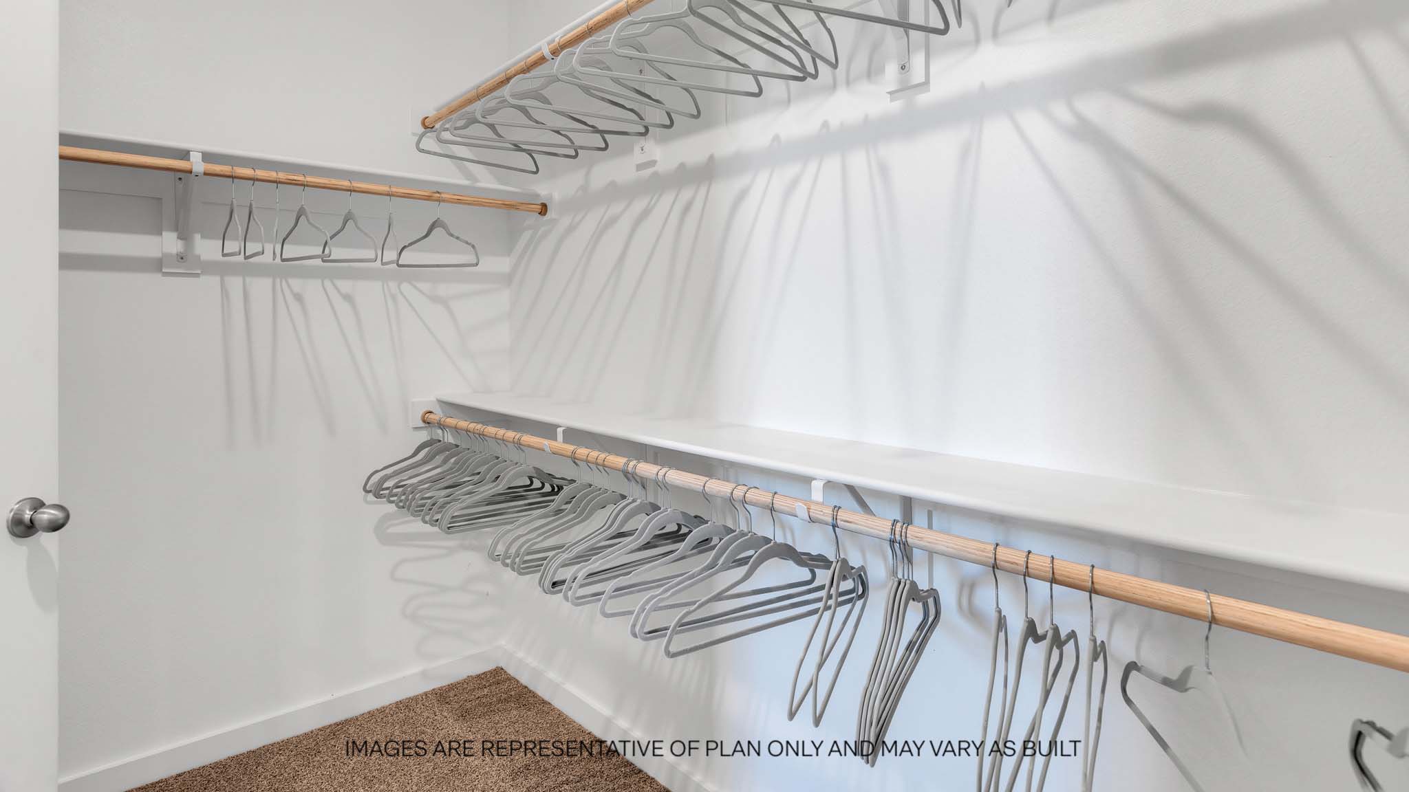 Primary walk-in closet with extra storage space