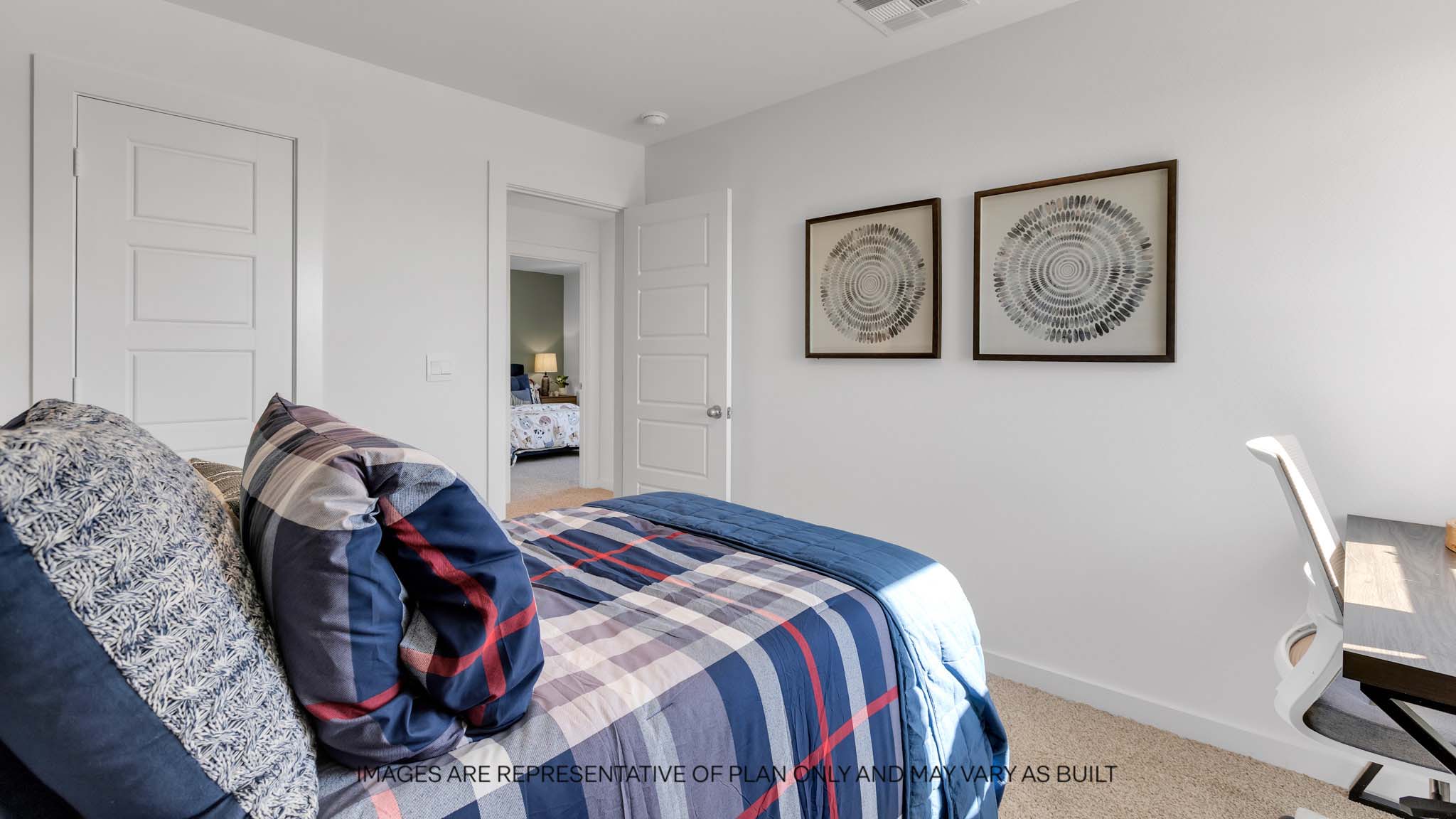upstairs Guest bedroom with plush carpet floors and spacious closet