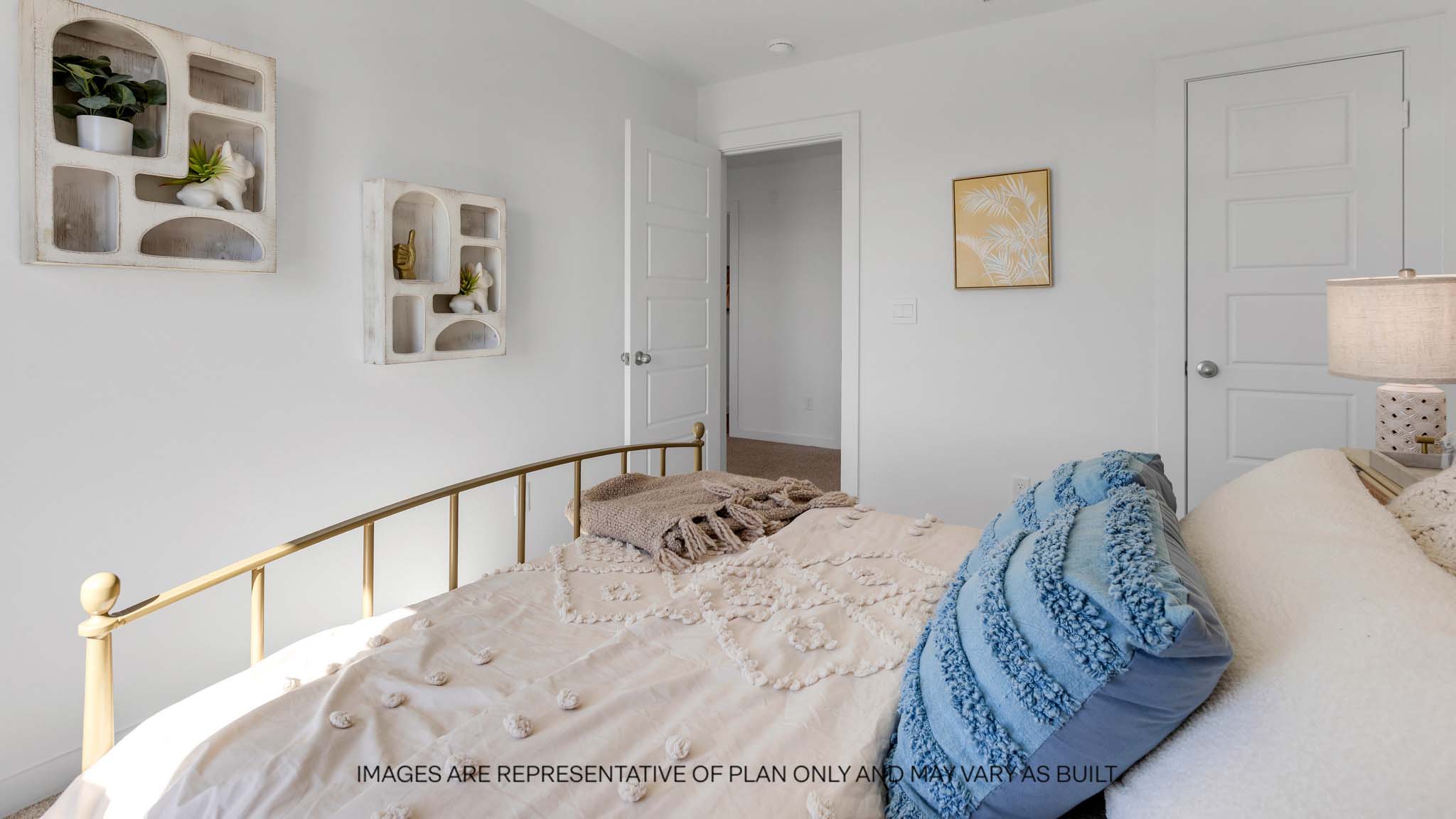 upstairs Guest bedroom with plush carpet floors and spacious closet