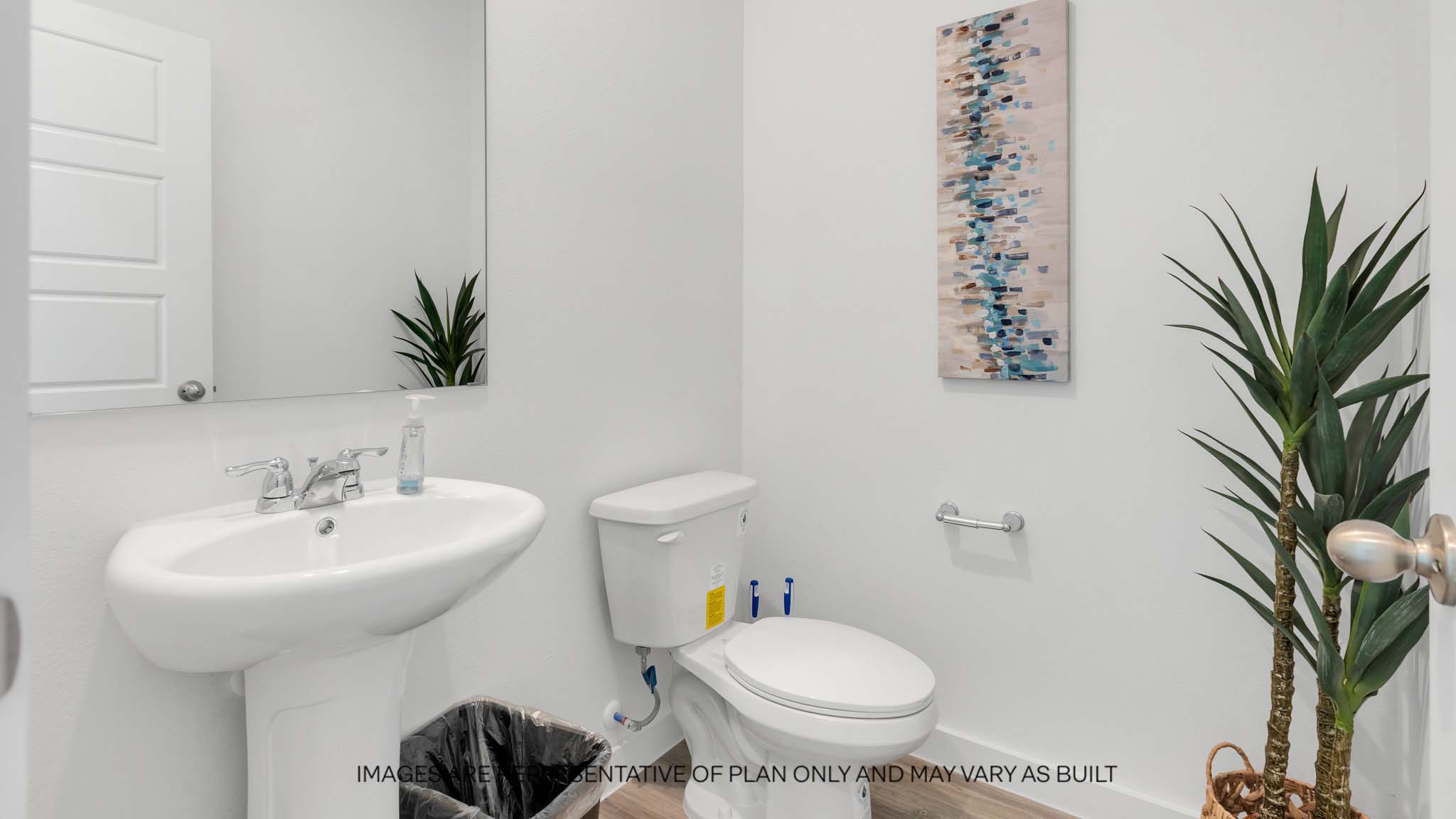 Half bathroom between common spaces