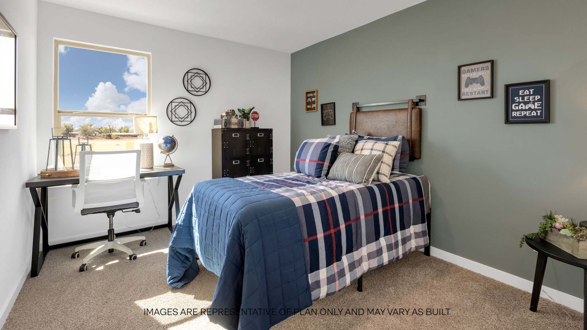 Upstairs guest bedroom with plush carpeted floors and ample natural light