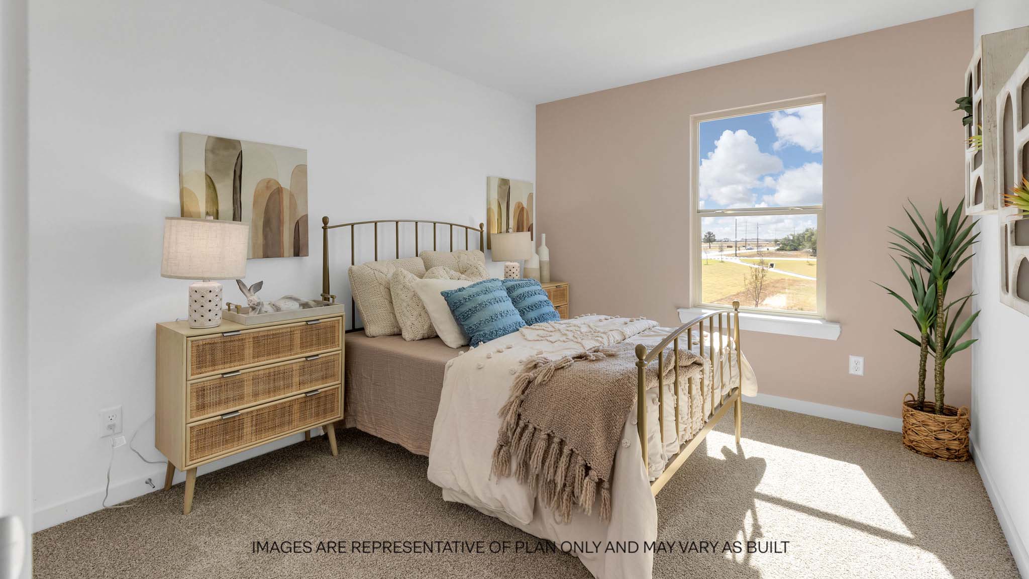 Upstairs guest bedroom with plush carpeted floors and ample natural light