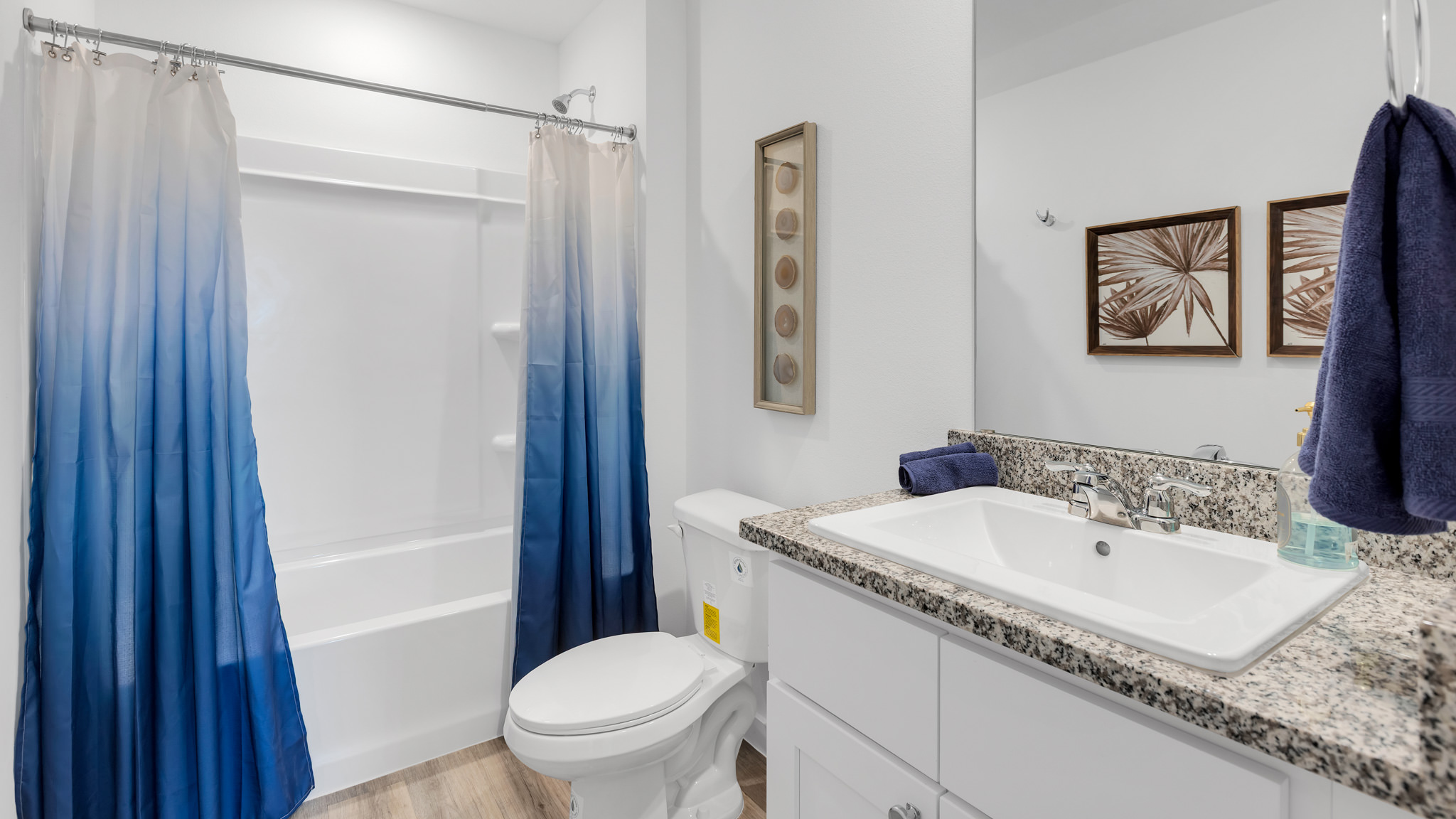 Guest bathroom located between guest bedrooms