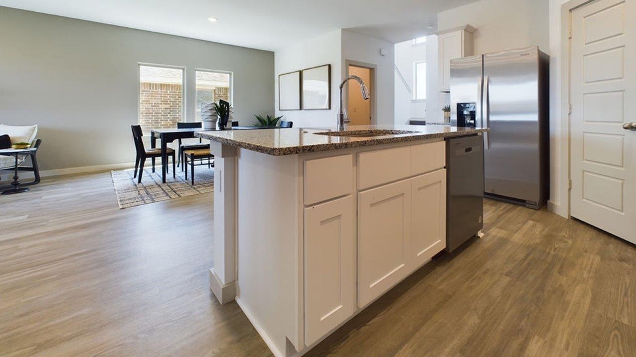 kitchen opens into spacious dining area