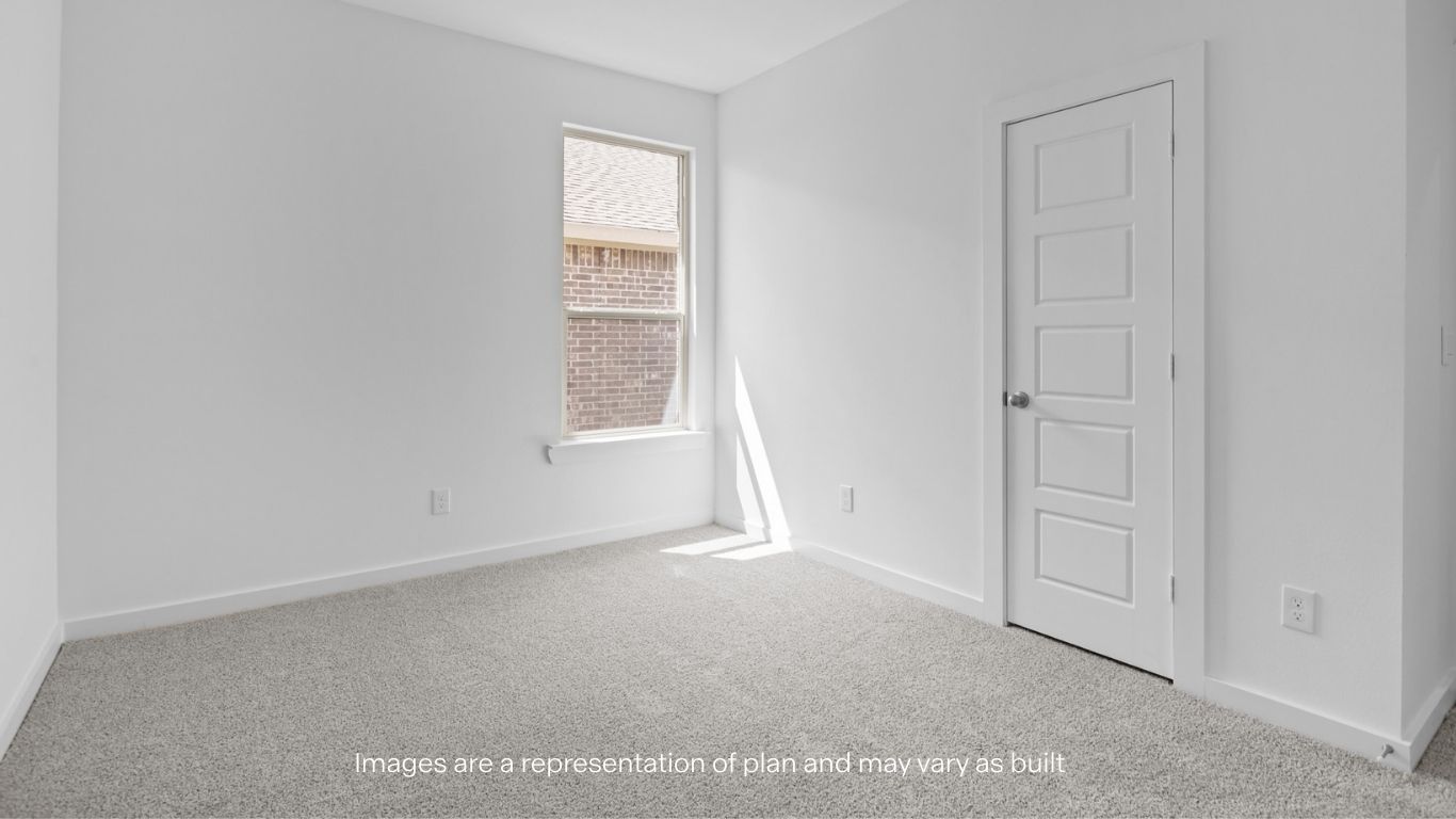 Guest bedroom 3 with plush carpet floors and spacious closet