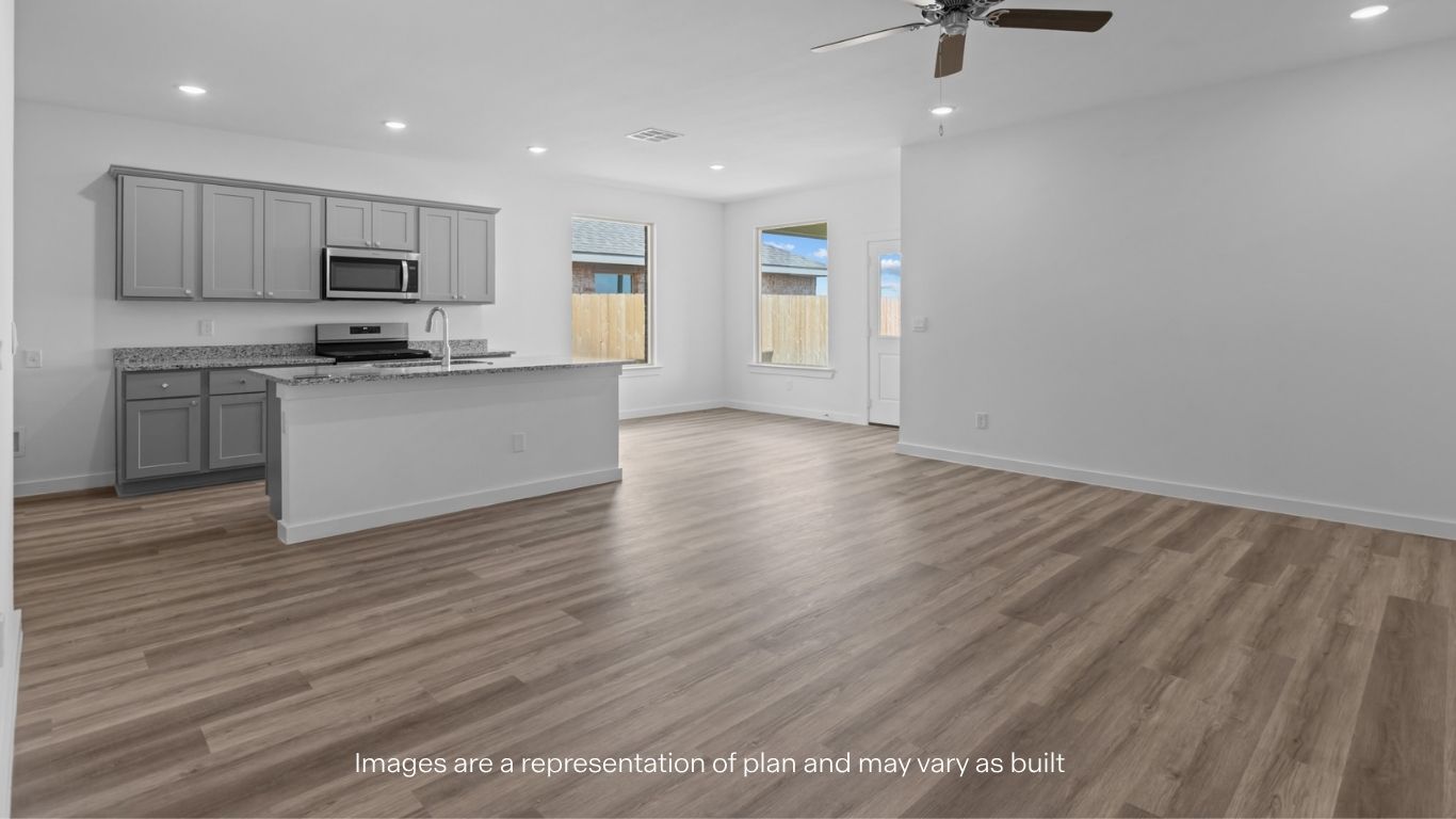 Spacious open concept kitchen with island and counter prep space