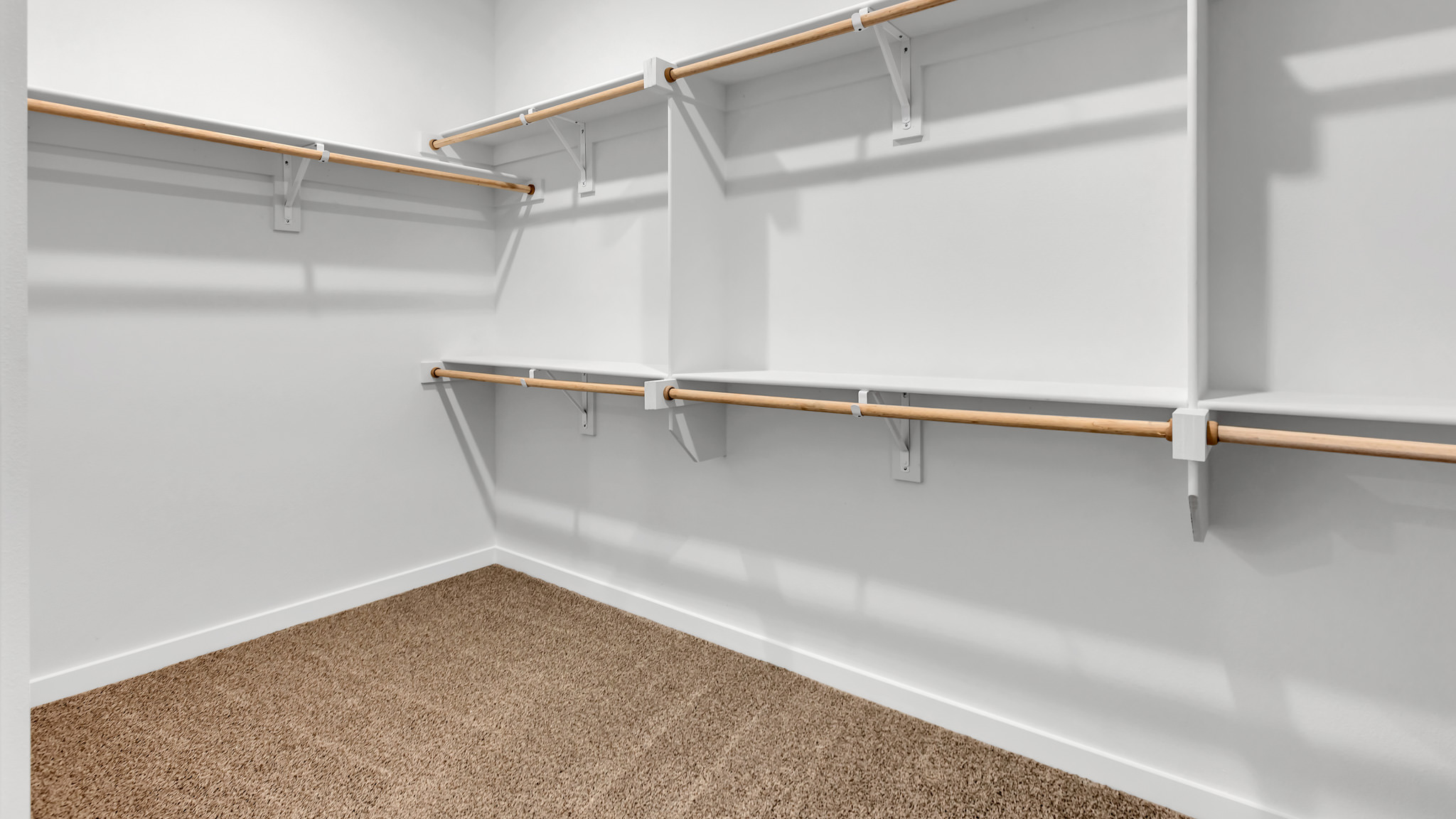 Primary walk-in closet with extra storage space