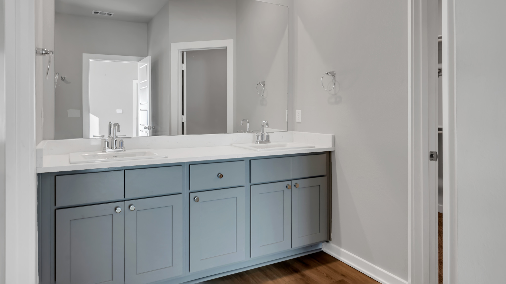Primary bathroom with built in double sink vanity