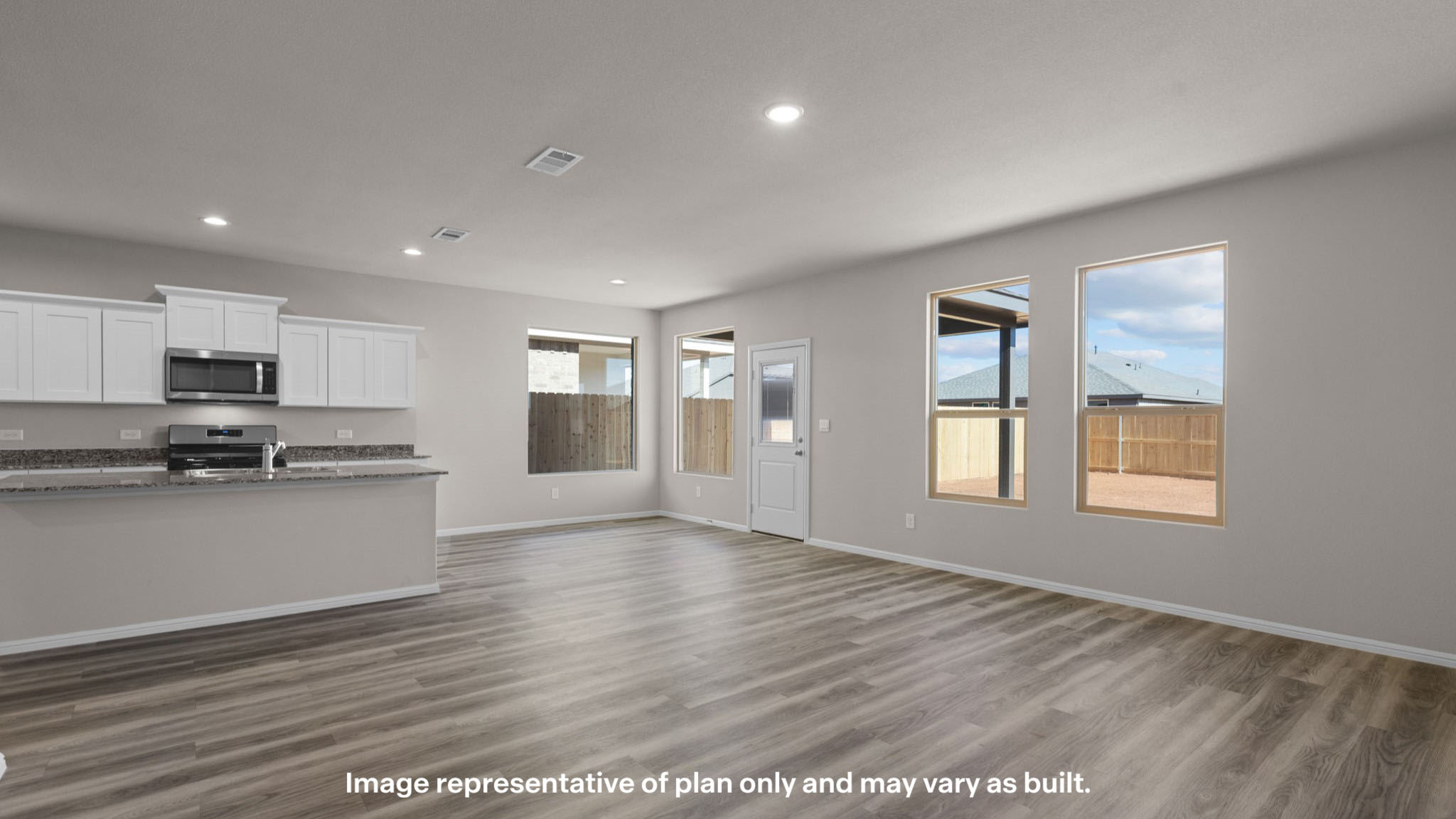 Open concept kitchen, living, family, and dining room space