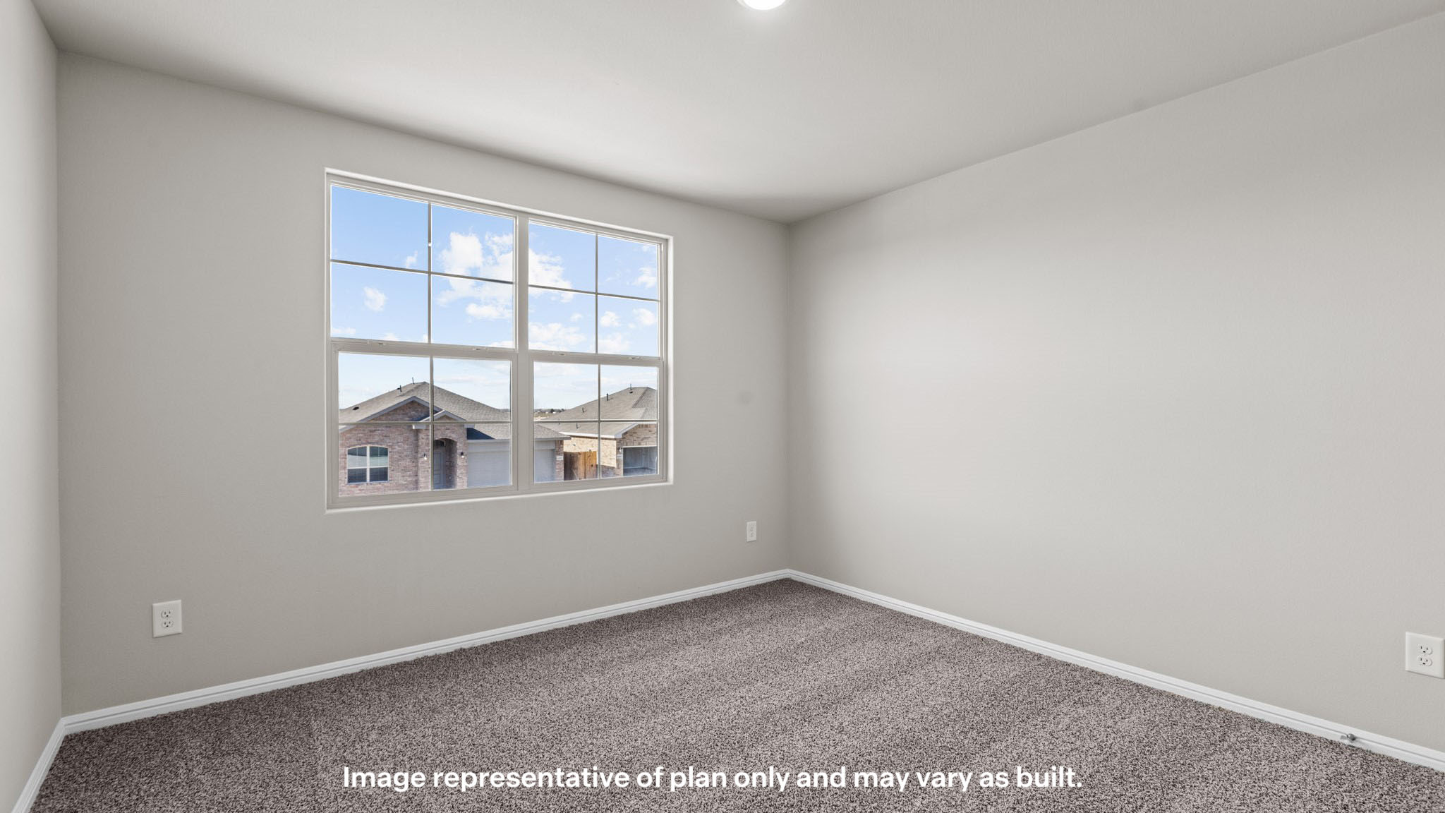 Upstairs guest bedroom with front windows