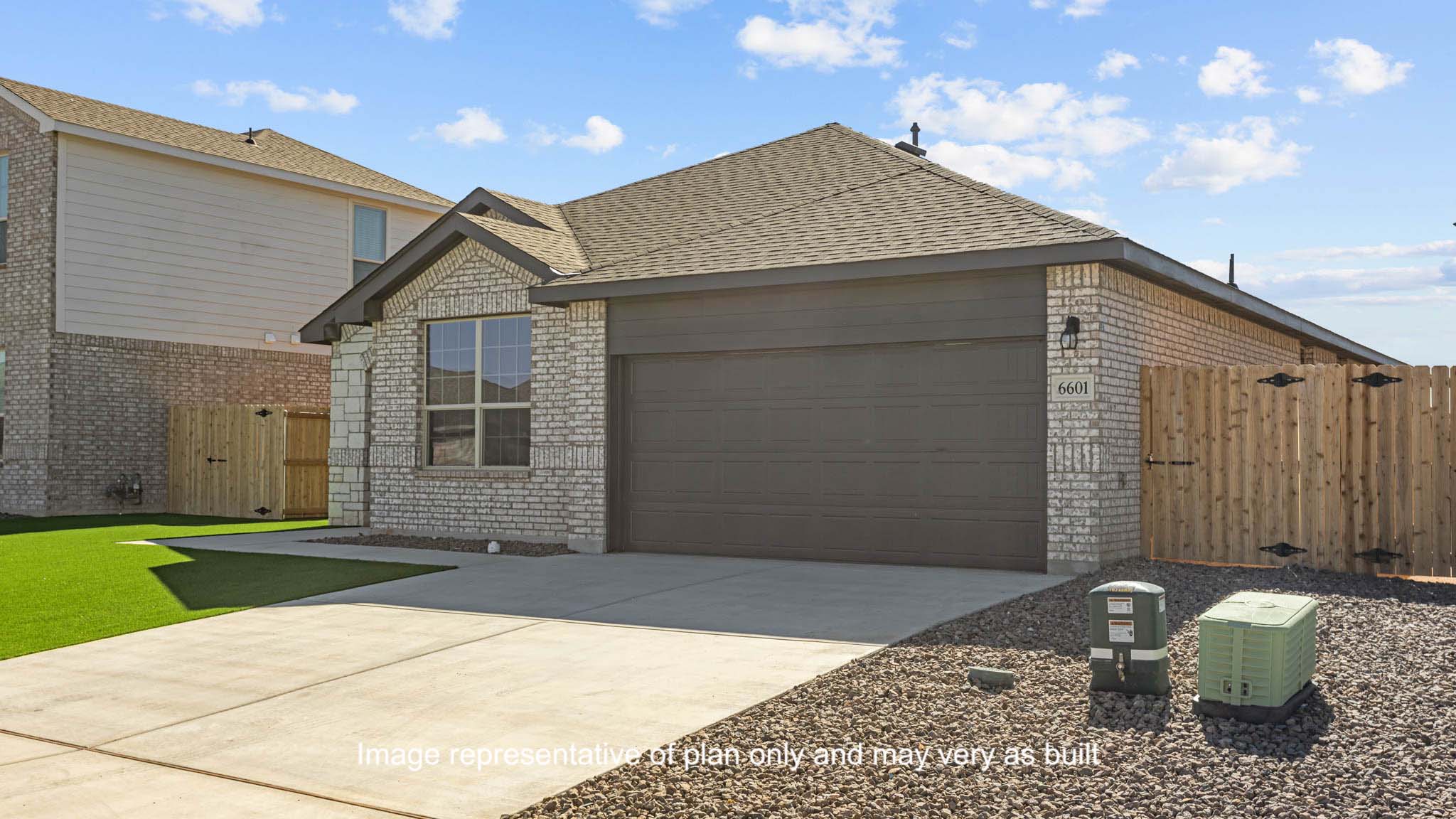 Side view of single story timeless brick home