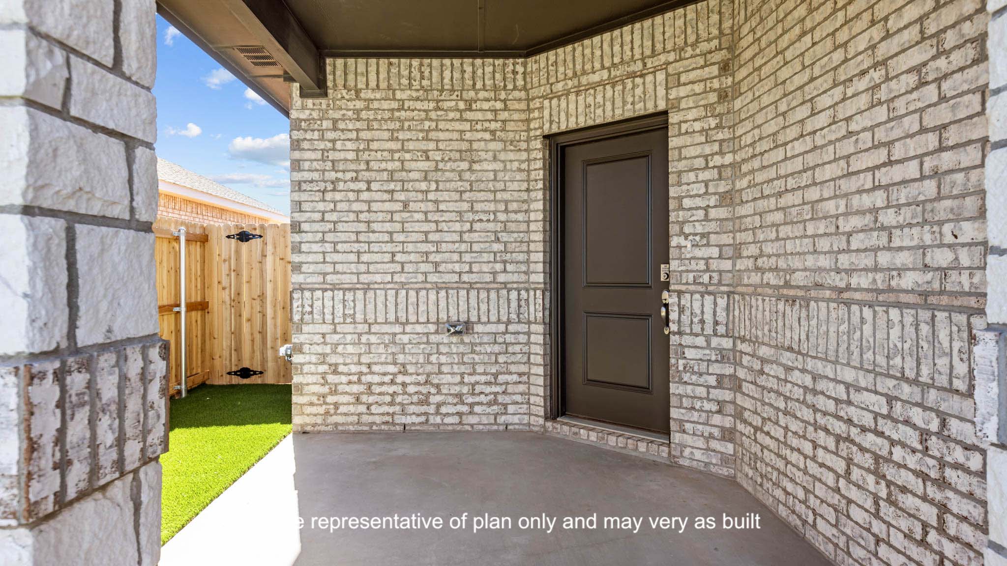 Single story classic brick home with front entry