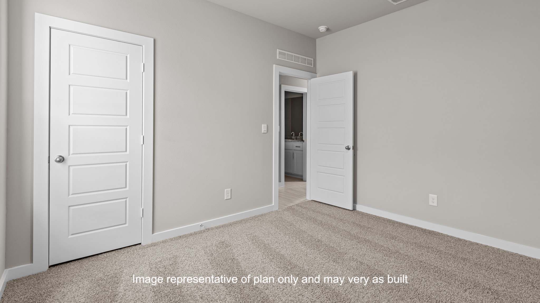 Guest bedroom 3 with plush carpet floors and spacious closet