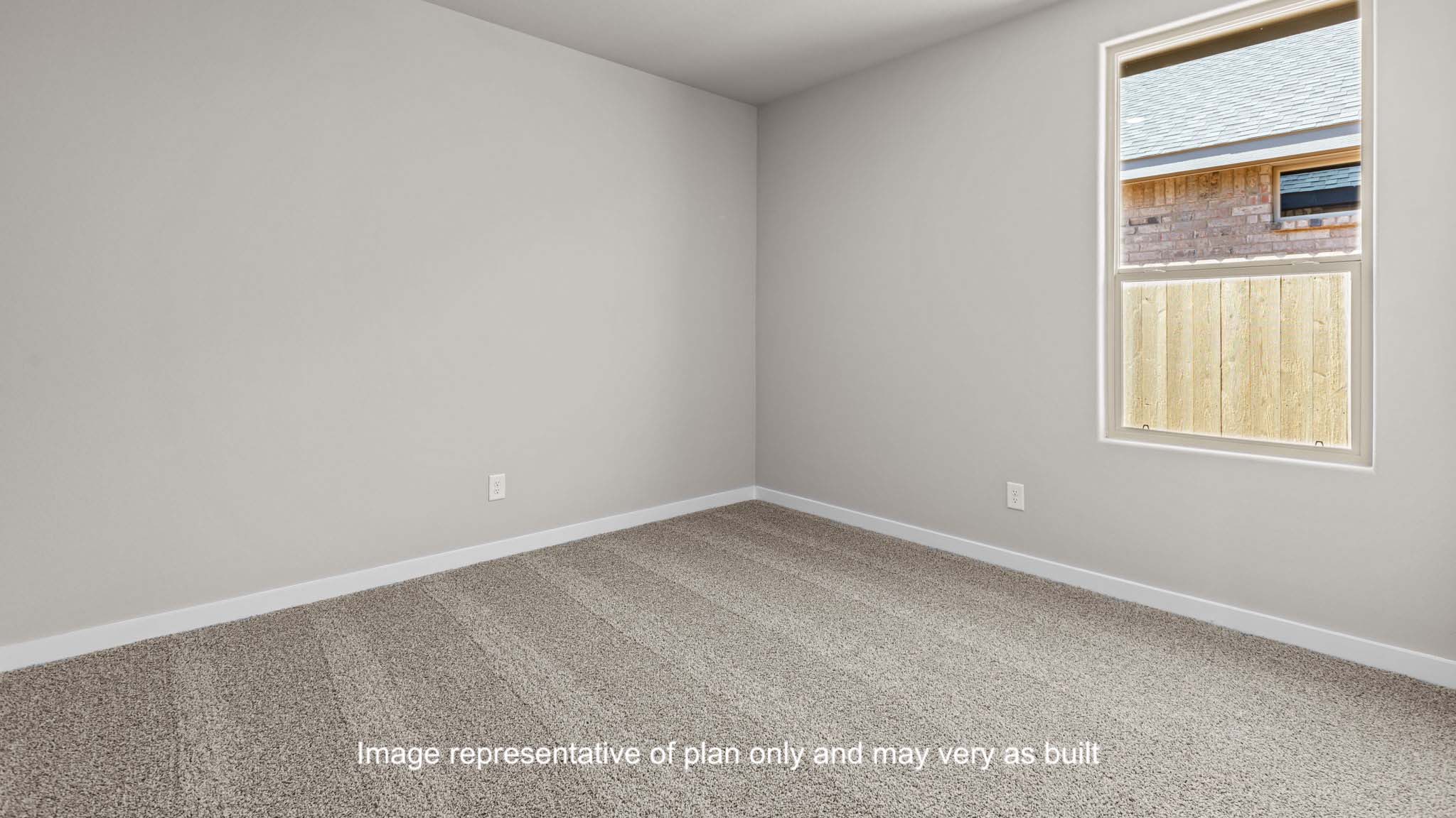 Bedroom 3 with side window and plush carpet floors