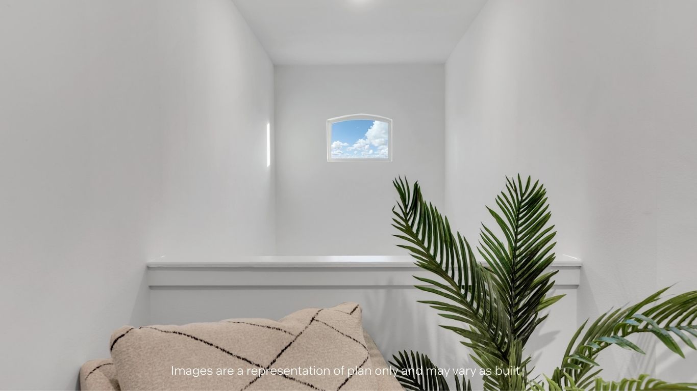 Upstars landing space loverlooking to downstairs foyer