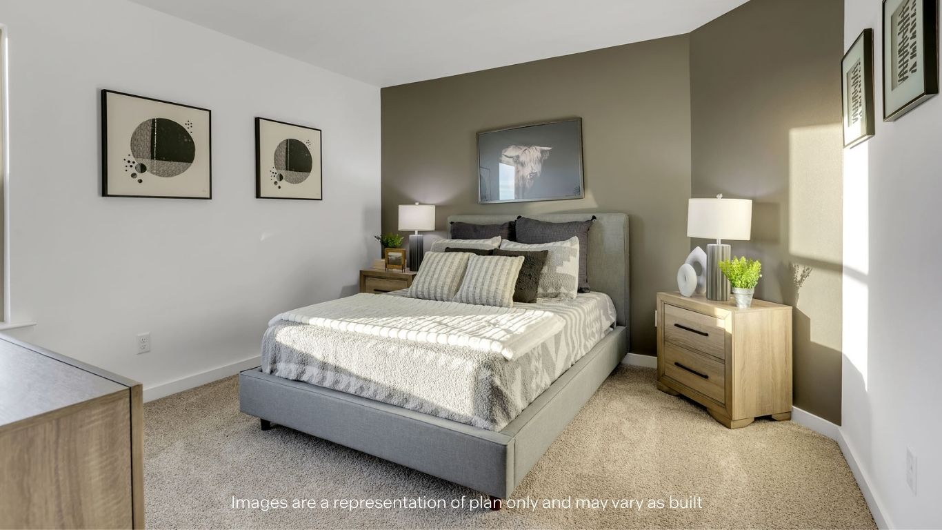 Guest bedroom 2 with side window and plush carpet floor