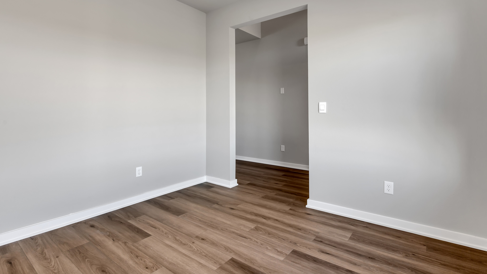 Spacious study room with front windows