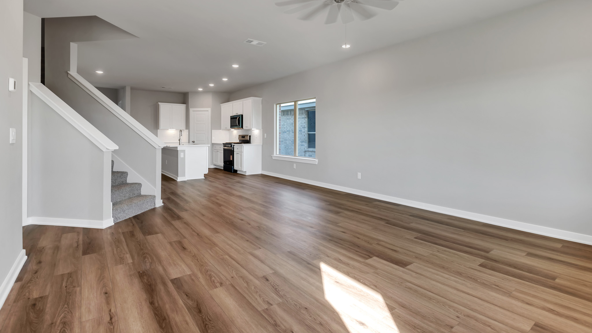 Open concept kitchen, living, family, and dining room space
