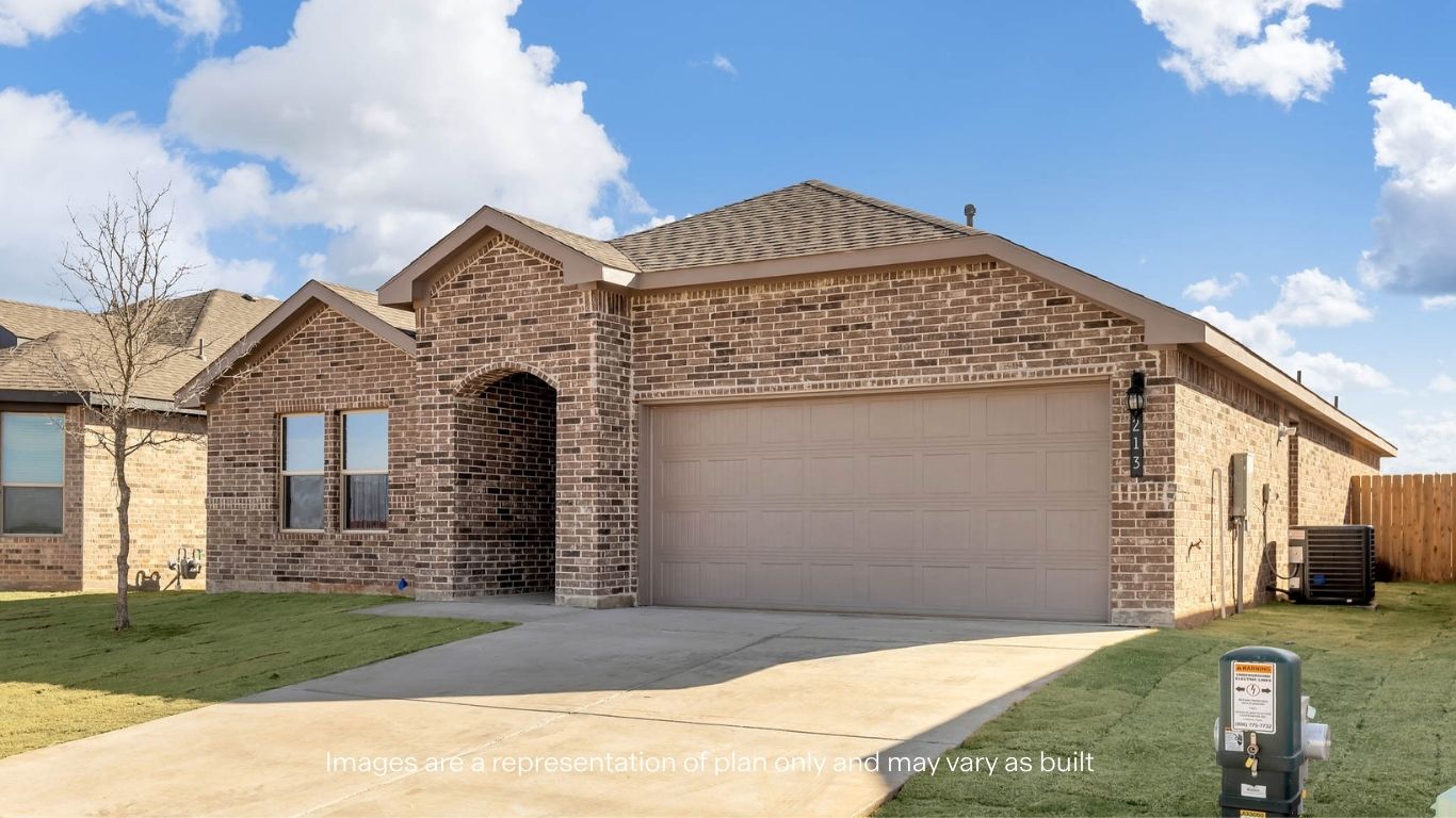 Side view of single story timeless brick home