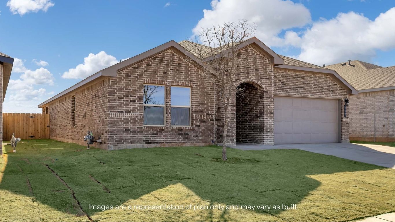 Side view of single story timeless brick home