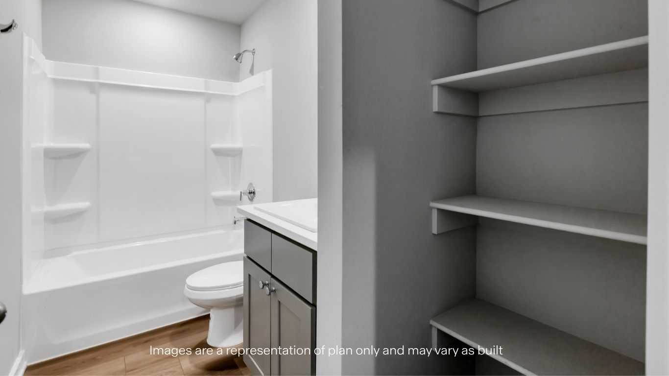 Guest bathroom with built in vanity and combination bathtub shower