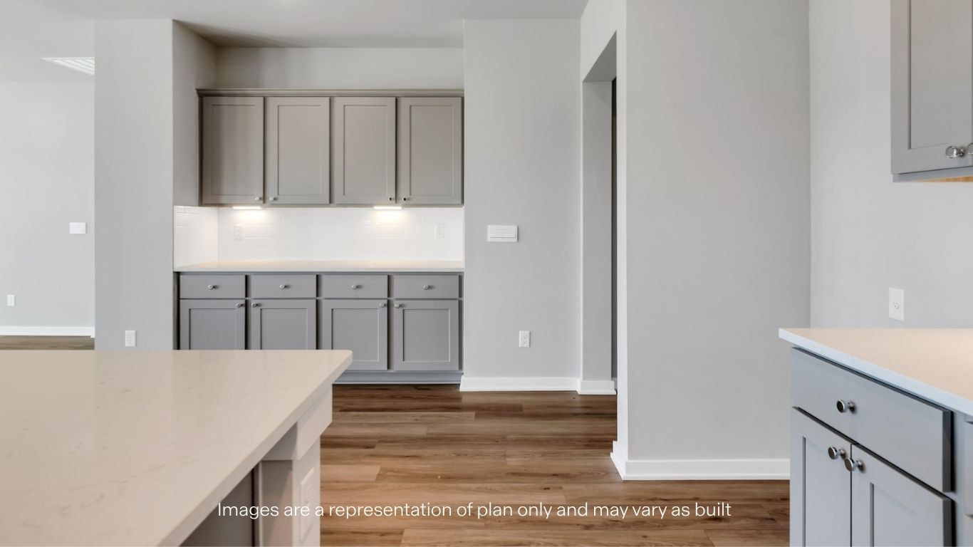 Spacious open concept kitchen with island and counter prep space