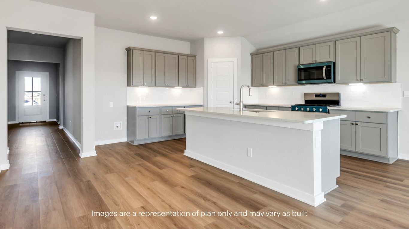 Spacious open concept kitchen with island and counter prep space