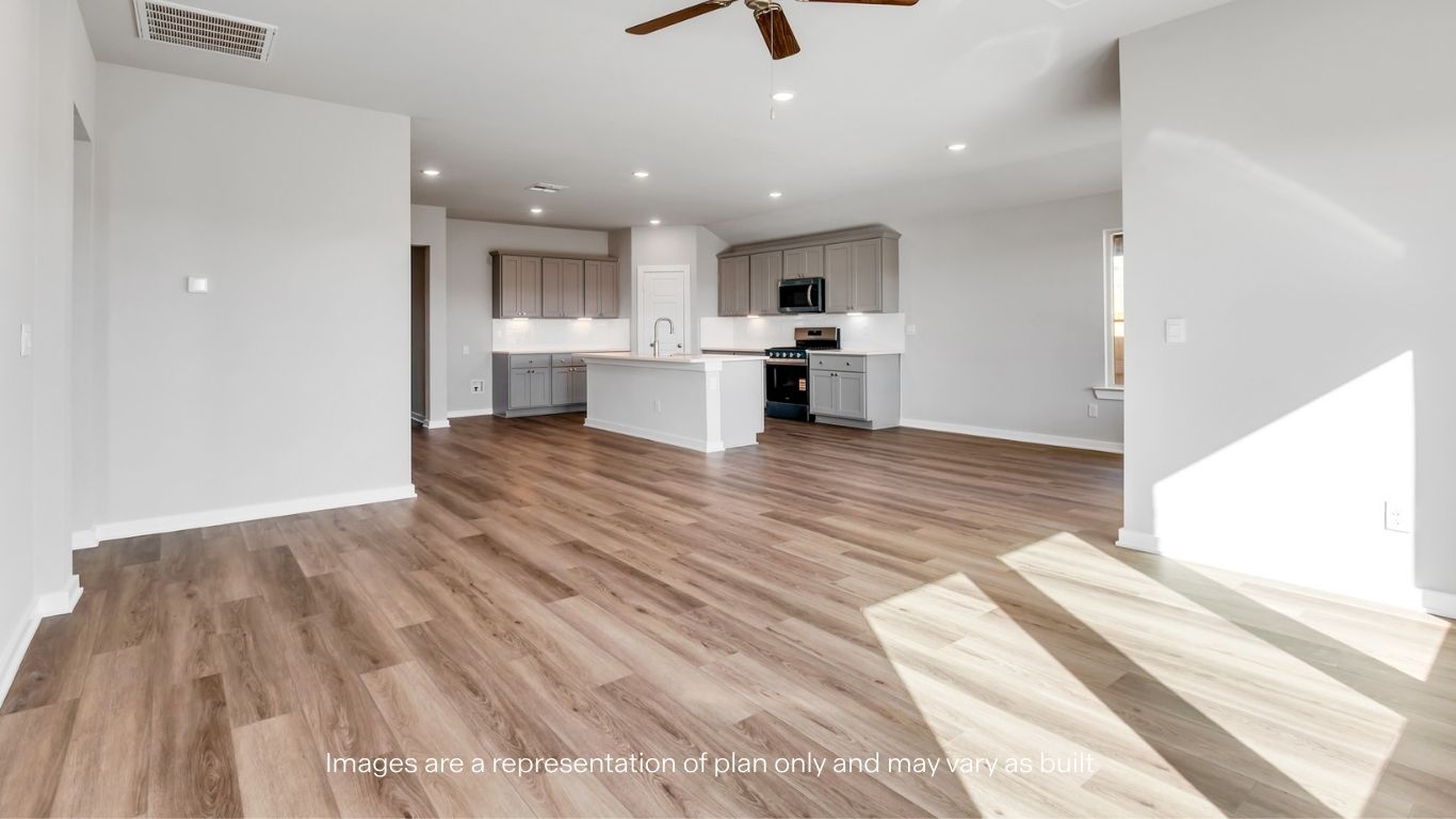 Open concept kitchen, living, family, and dining room space