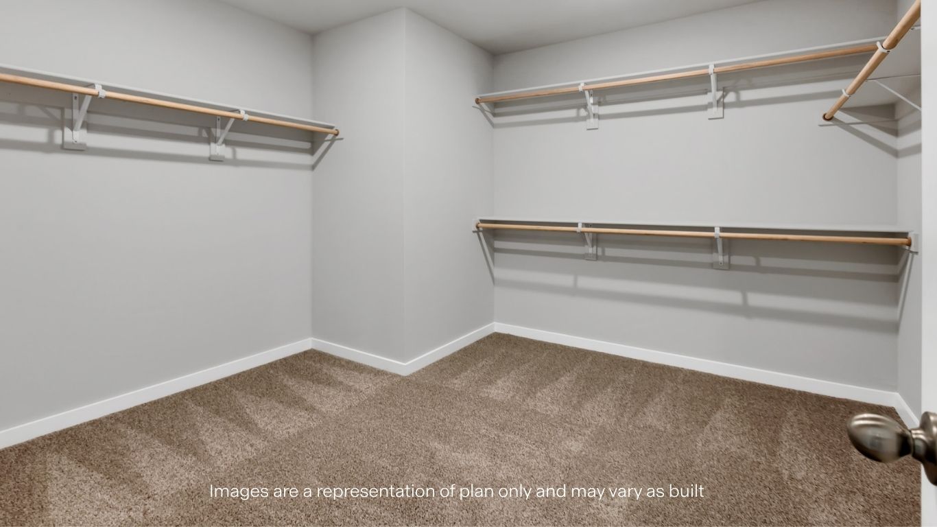 Primary walk-in closet with extra storage space