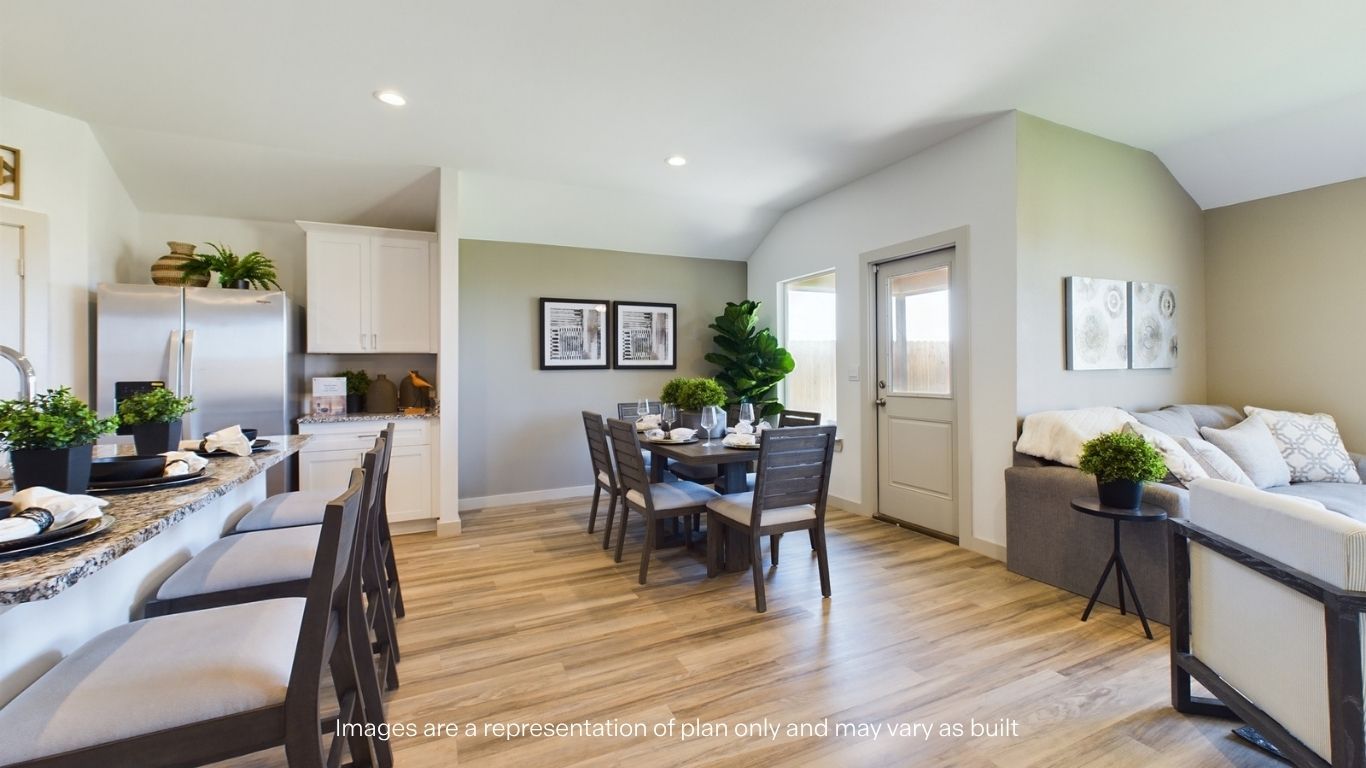 Open concept kitchen, living, family, and dining room space