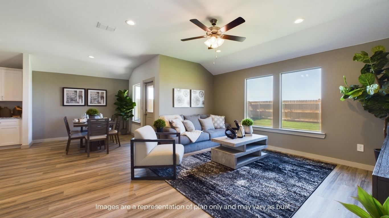 Open living and family room area with ample natural light