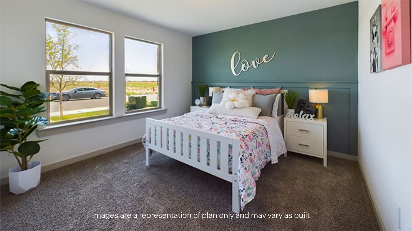 Bedroom with front windows and spacious closet