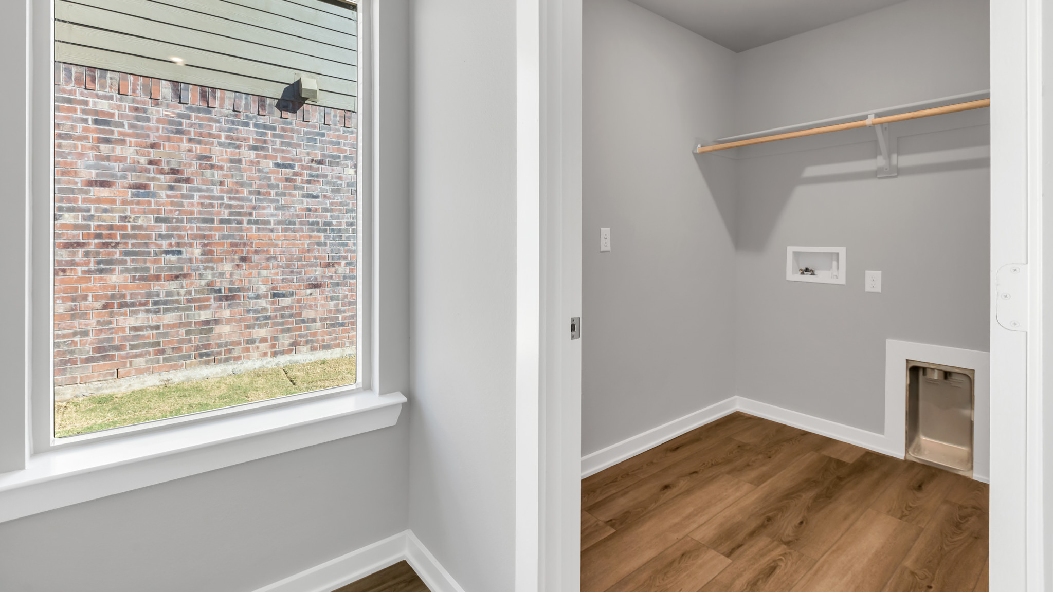 Laundry room and utility closet space with extra storage