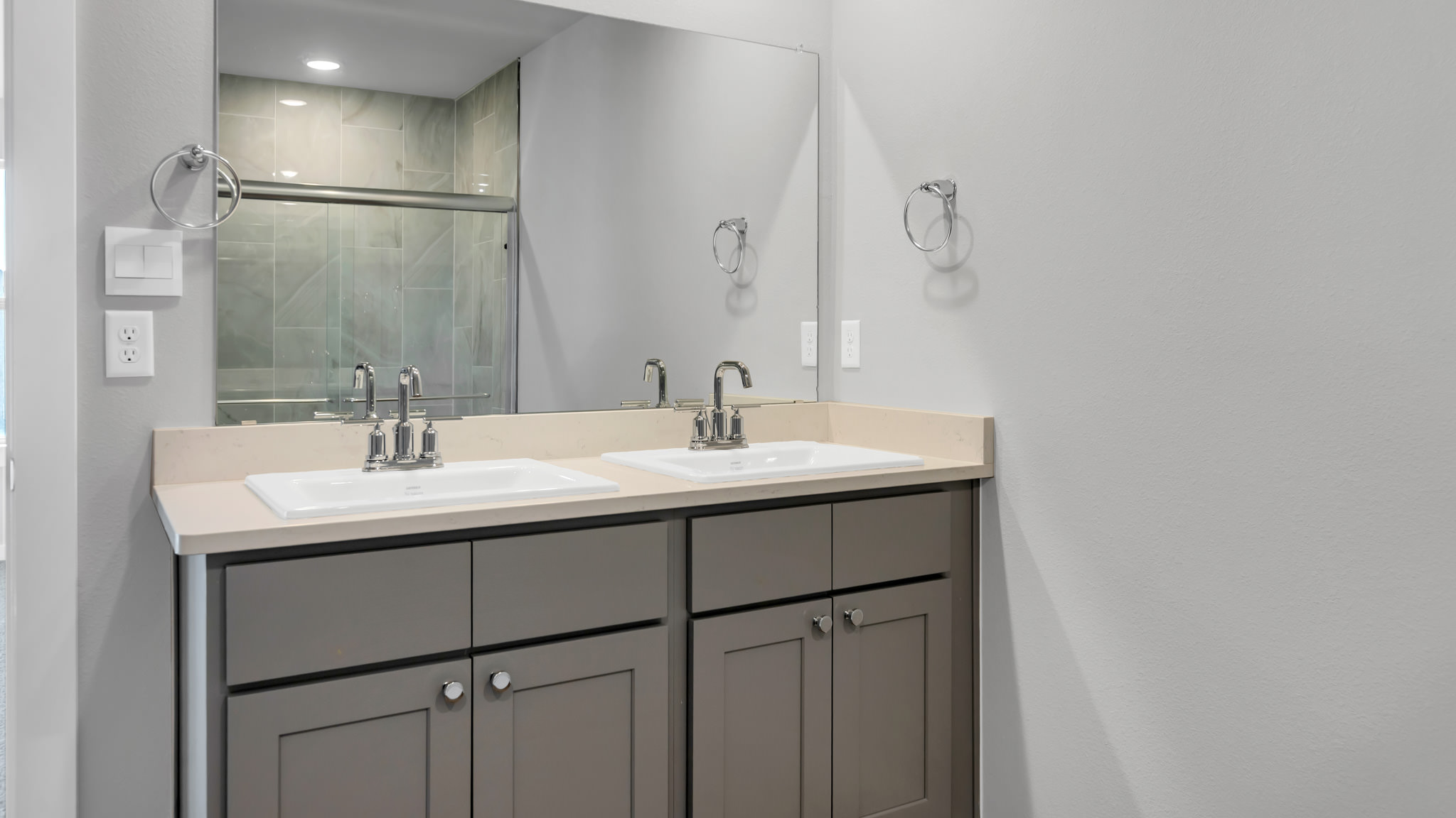 Private attached primary bathroom with built in vanity