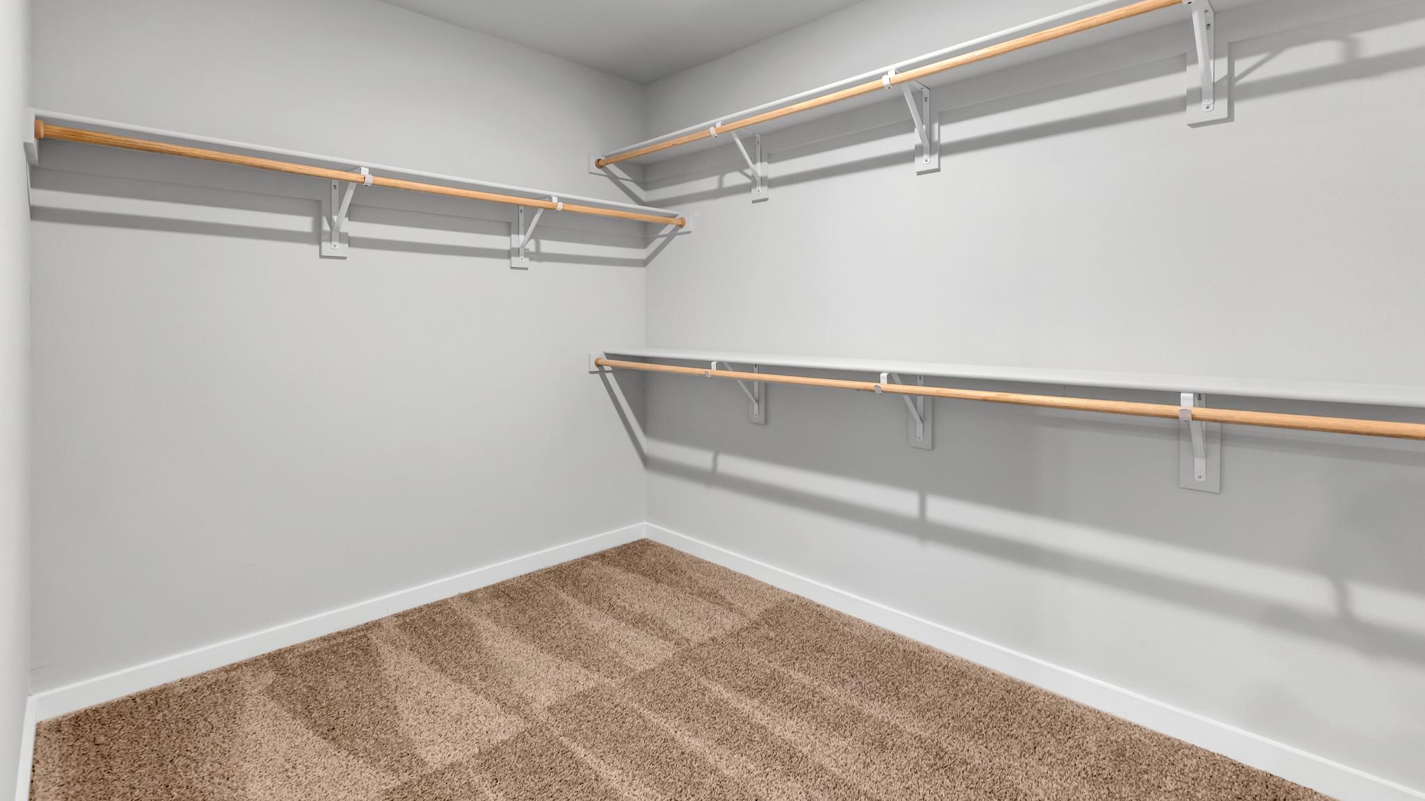 Primary walk-in closet with extra storage space