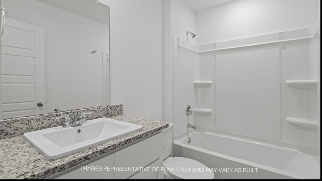 Guest bathroom with built in vanity and combination bathtub shower