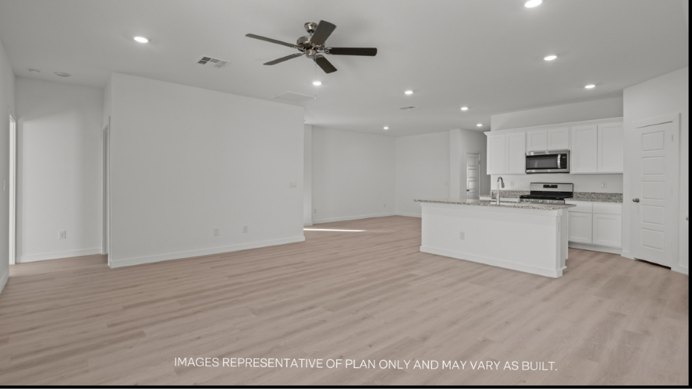 Open concept kitchen, living, family, and dining room space