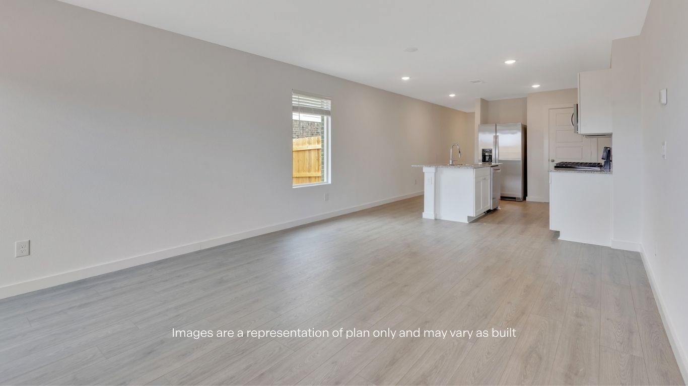 Open concept kitchen, living, family, and dining room space
