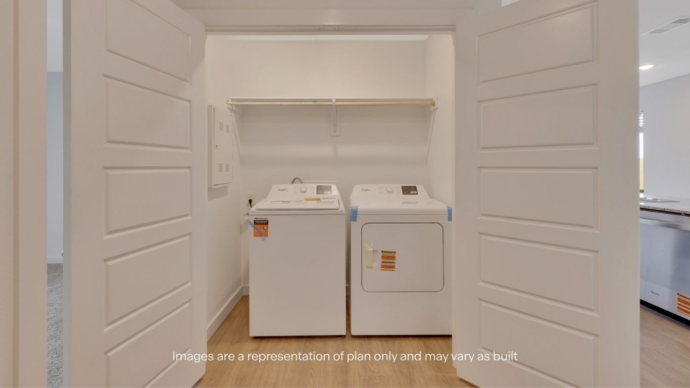 Laundry room and utility closet space with extra storage