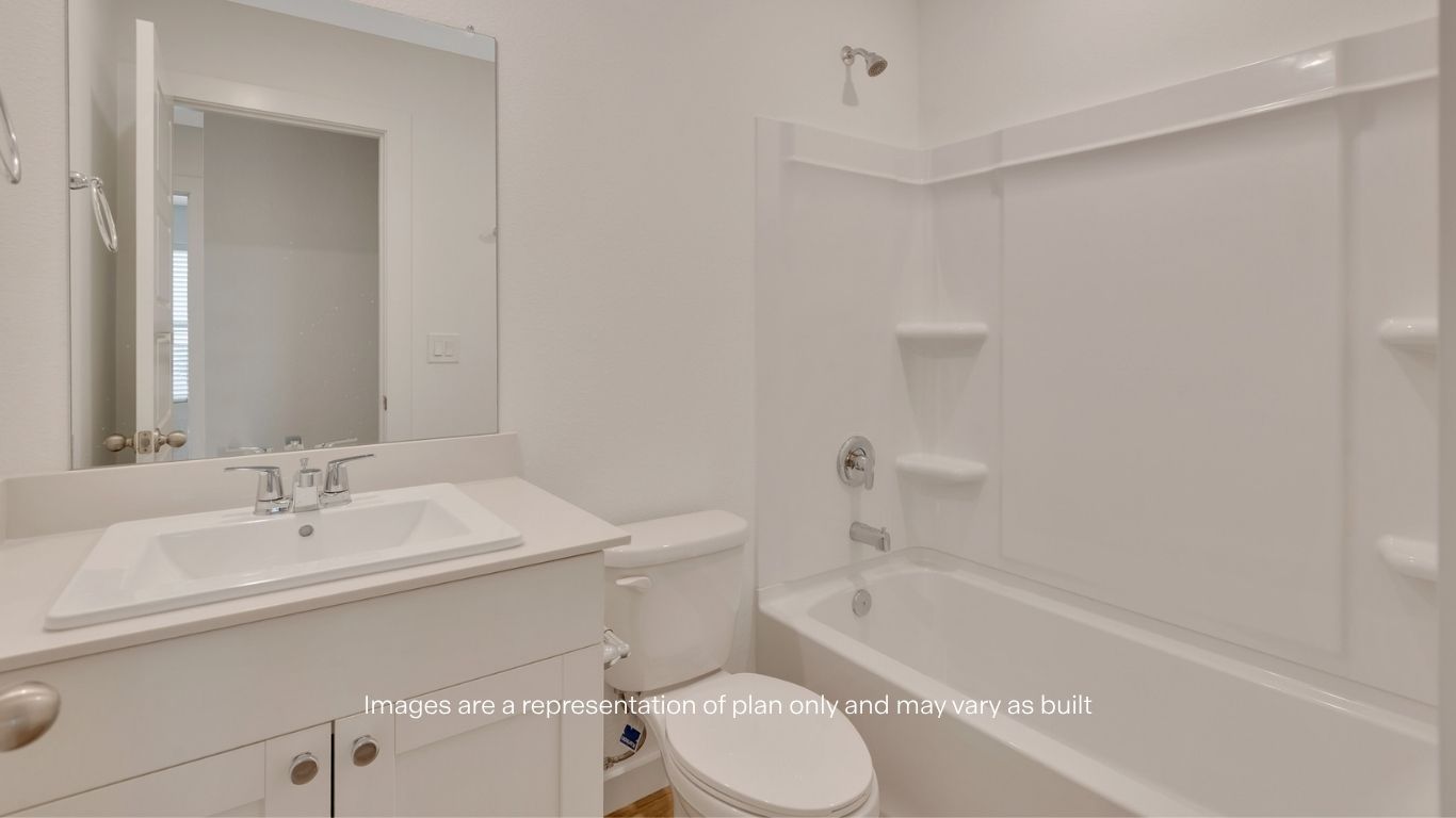 Guest bathroom with built in vanity and combination bathtub shower