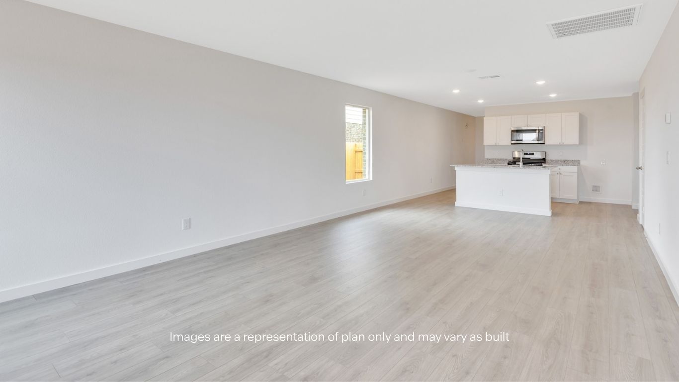 Open concept kitchen, living, family, and dining room space
