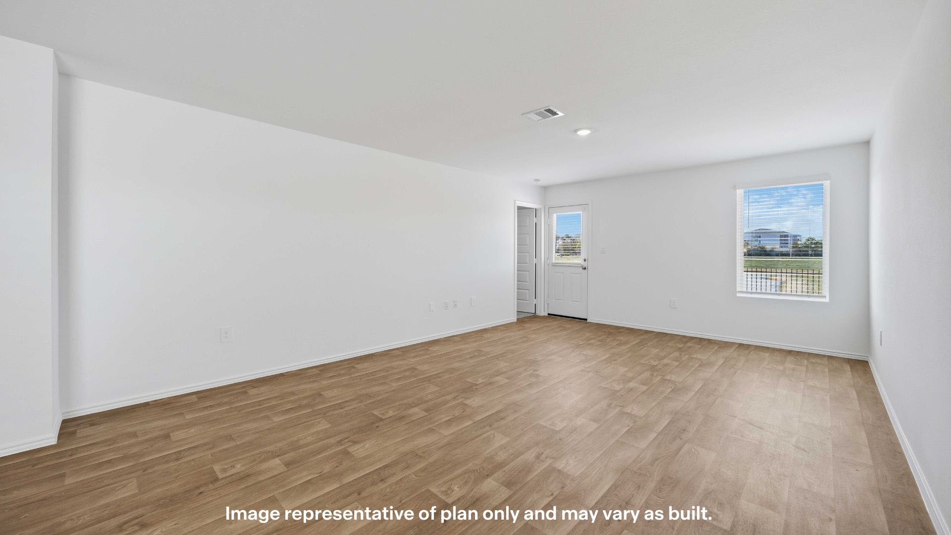 Open living and family room area with ample natural light