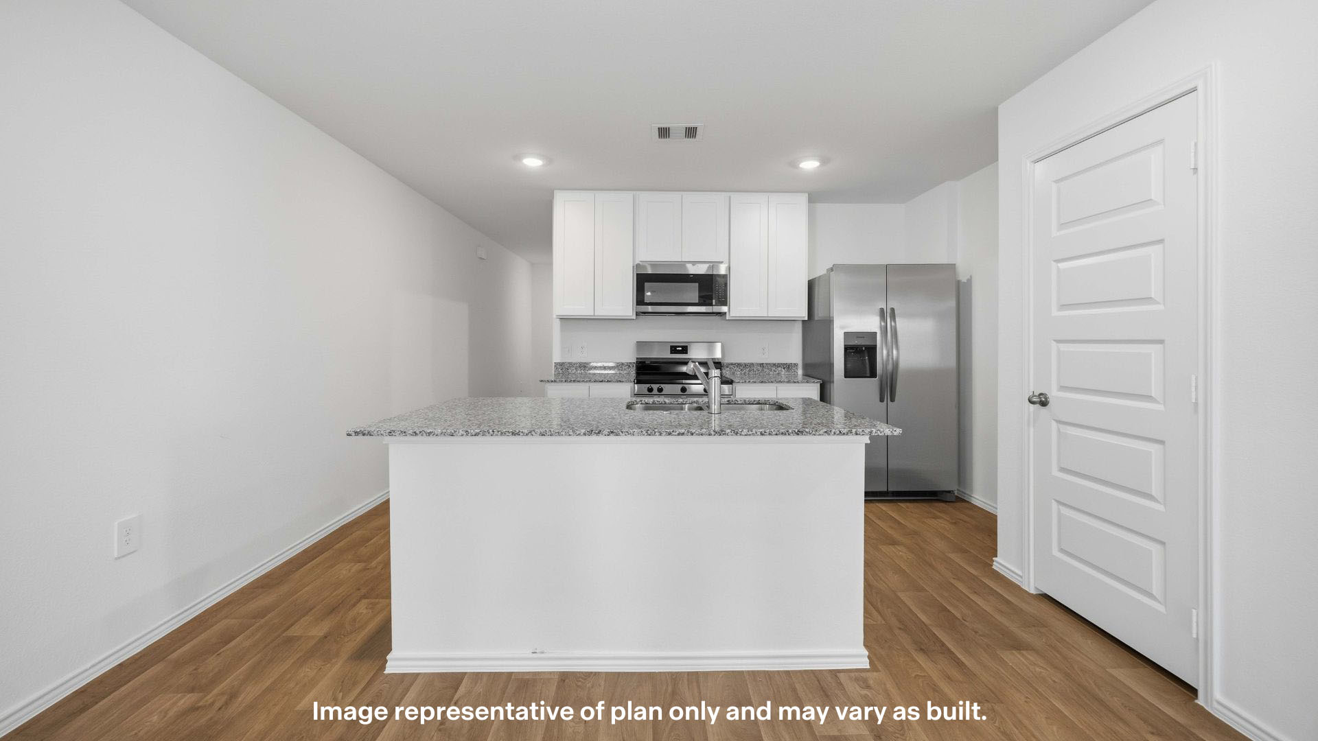 Open concept kitchen with stainless steel appliances, shaker style cabinets, and elevated finishes