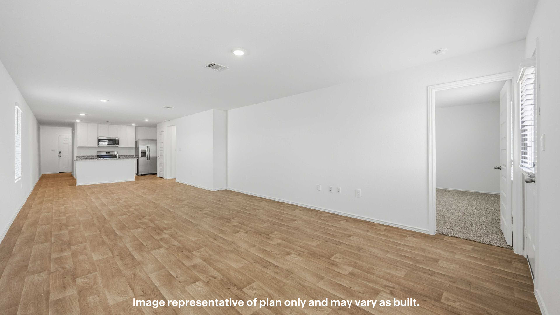 Open concept kitchen, living, family, and dining room space