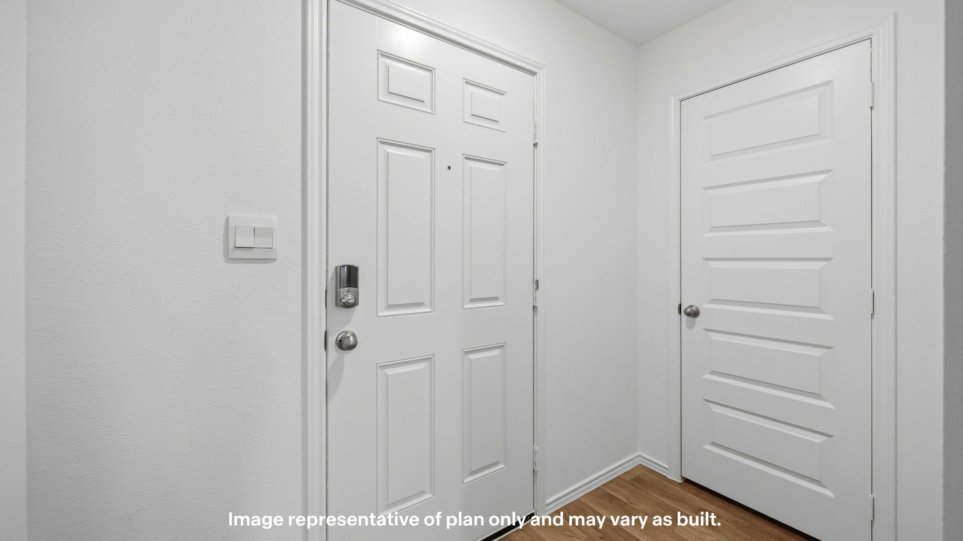 Front entry way with coat and laundry closets