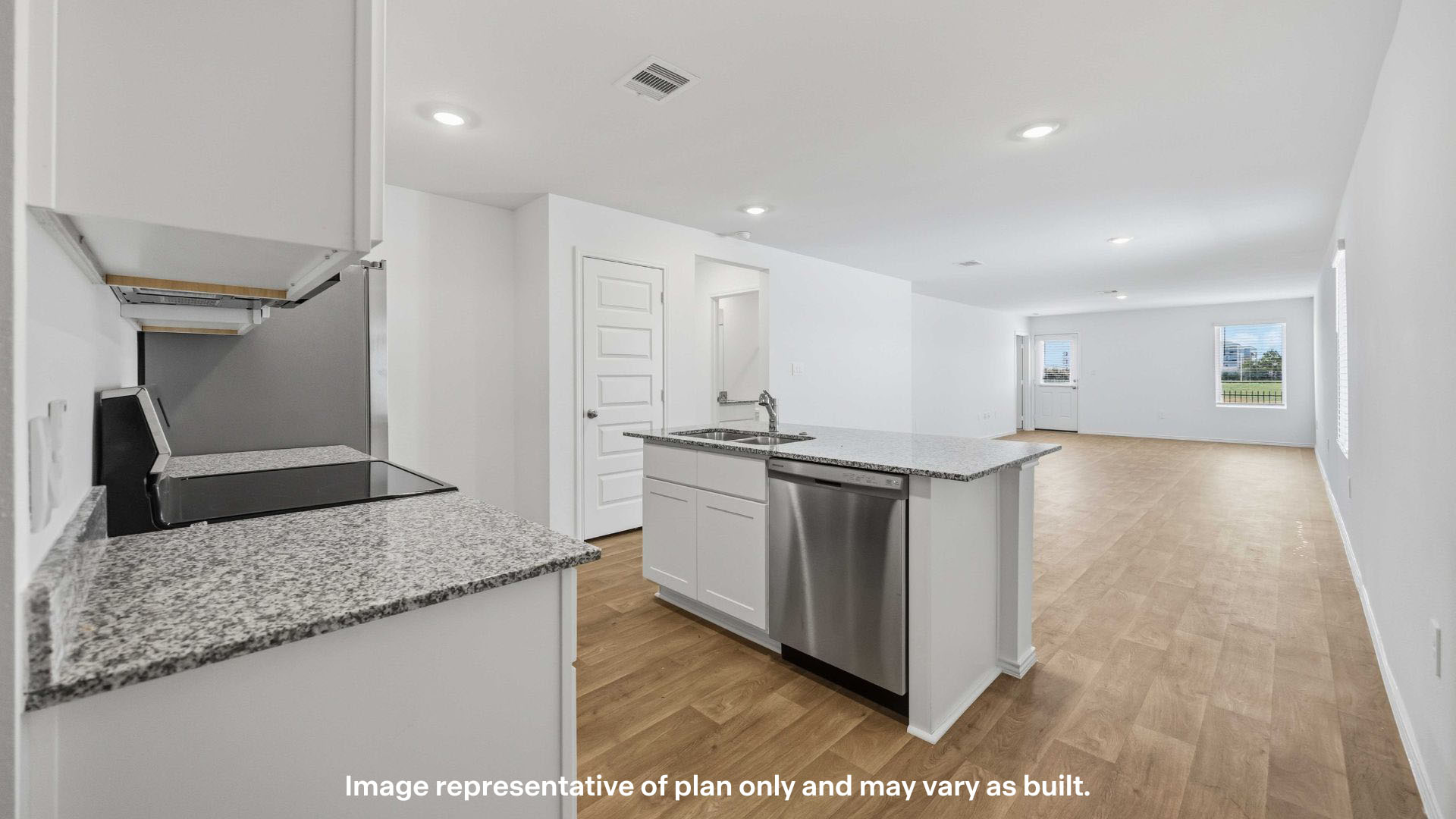 Spacious open concept kitchen with island and counter prep space